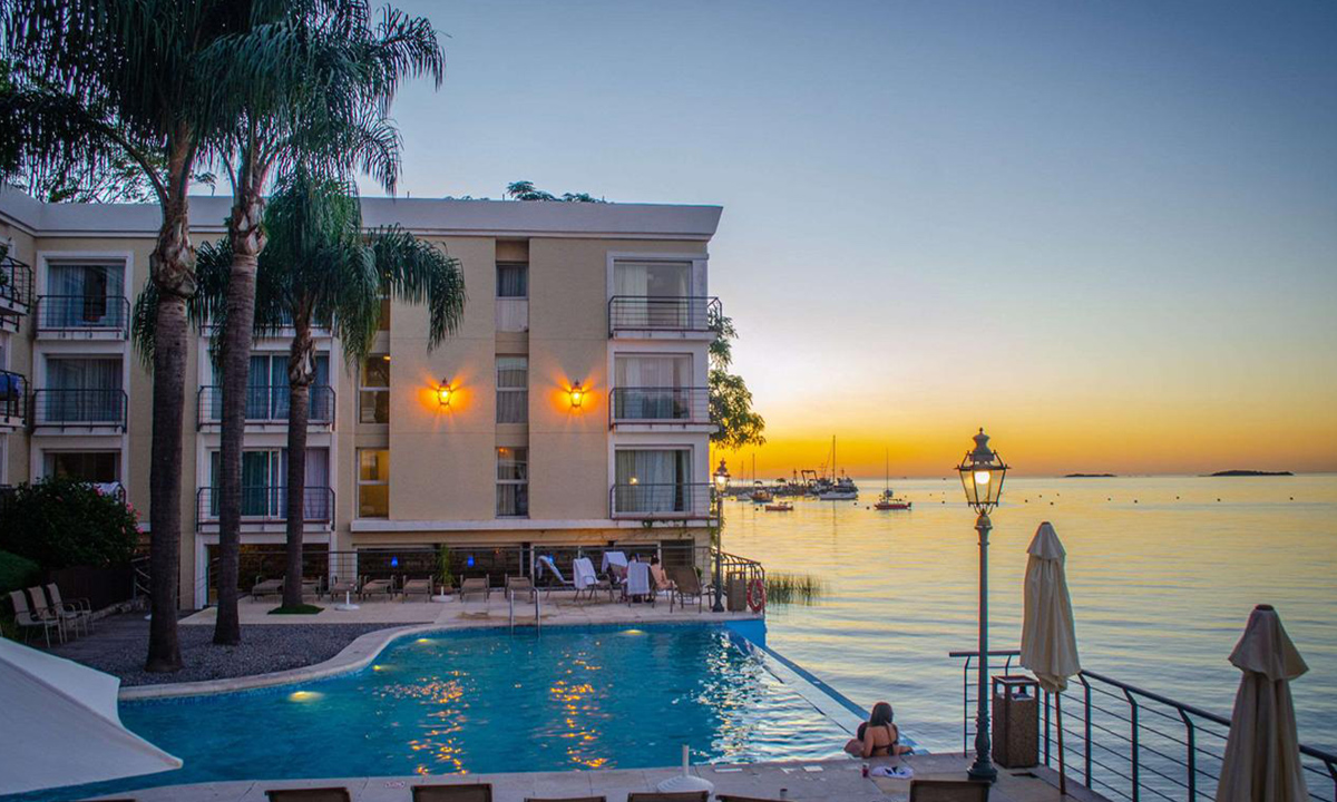 2 Experience luxury at Radisson Montevideo Hotel with stunning river views and top-notch amenities. Enjoy a private city tour and explore Punta del Este